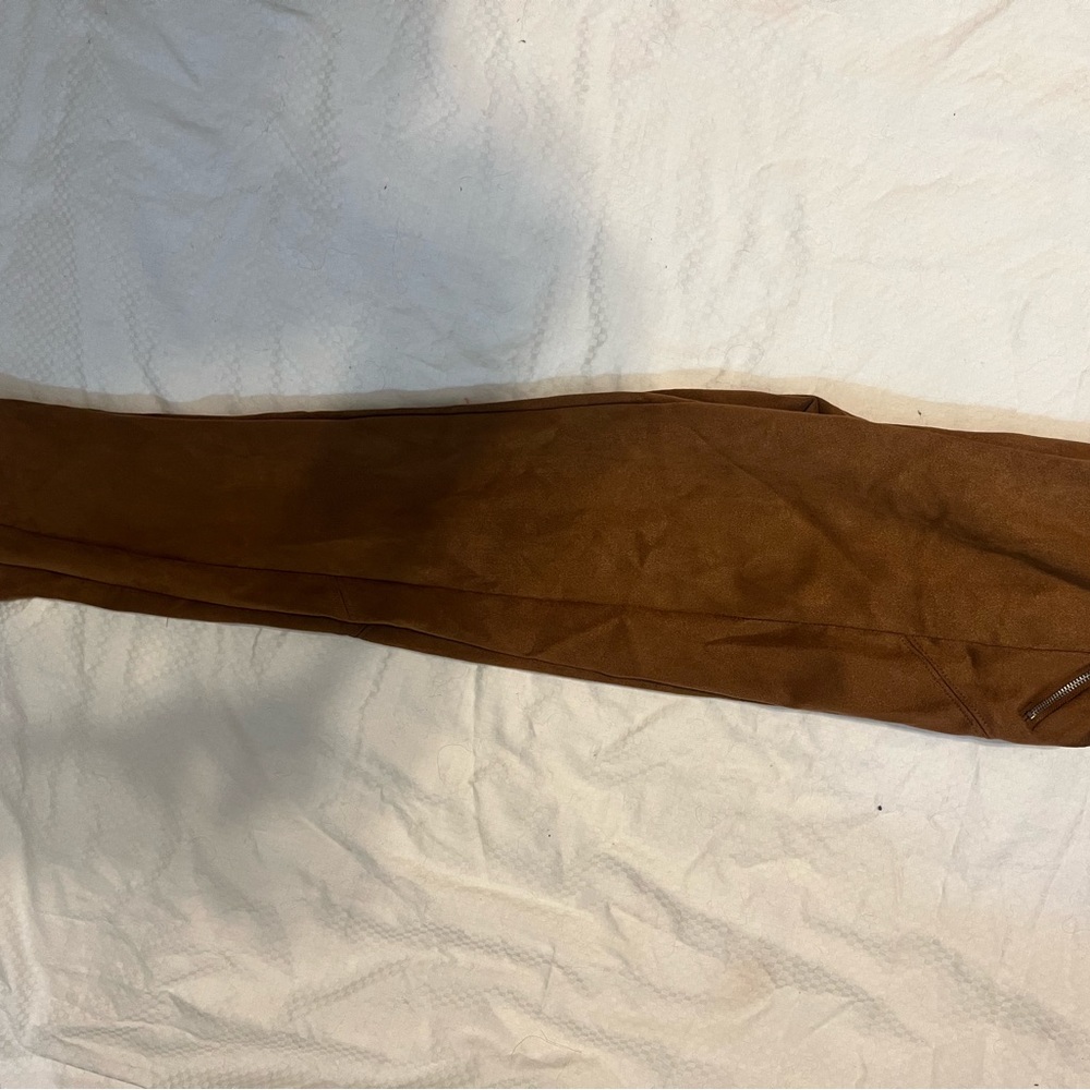 Only one time use, xs polyester, spandex brown color